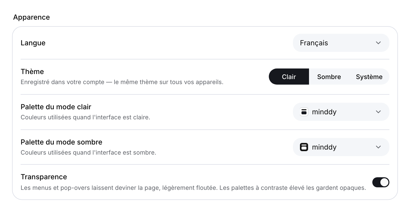 Sélecteur de langue, commandes des thèmes clair, sombre et système, sélecteurs de palette des modes clair et sombre et interrupteur de transparence.